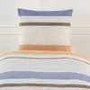 A close-up view of a pillow and a duvet cover with a striped and paisley pattern. Produktbild-Vorschau