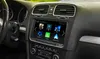 The image shows the interior of a car with a focus on the infotainment system screen. Podgląd zdjęcia produktu