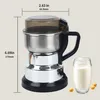A soy milk maker with dimensions shown, next to a glass of soy milk and soybeans. Produktbild-Vorschau