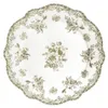 A white plate with a green floral pattern and a scalloped edge. Náhľad obrázku produktu
