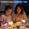 A mother and daughter are painting DIY moon lamps together. Produktbild-Vorschau