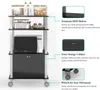 A black and silver microwave cart with three shelves and a cabinet at the bottom, shown against a white background. Text callouts highlight features like premium MDF shelves, a door storage cabinet, and wheels for easy movement. Náhľad obrázku produktu