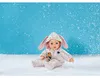 MGA BABY born Schneeanzug Creme 43cm Voir les images du produit 12