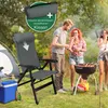People are having a barbecue in a park with a camping chair and cooler in the foreground. Produktbild-Vorschau