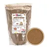 A bag of cocoa powder next to a wooden bowl filled with cocoa powder. Anteprima dell’immagine prodotto