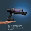 A hand holding a cordless vacuum cleaner against a gradient blue background. Náhled obrázku produktu