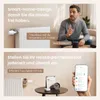A man interacting with a smart home device and a product being controlled remotely via a smartphone. Produktbild-Vorschau