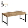 A diagram showing the dimensions of a desk with a silhouette of a person for scale. Voir les images du produit