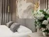 A bedroom scene with a bed, pillows, curtains, and wallpaper. Náhled obrázku produktu