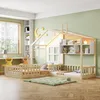 A child's bedroom with two connected wooden house-shaped beds, a window, and shelves. Anteprima dell’immagine prodotto