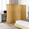 A room divider is placed between a desk area and a bed. Anteprima dell’immagine prodotto