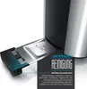 A close-up shot of a toaster's crumb tray, with text overlays in German explaining cleaning instructions. The toaster is silver and black. Voir les images du produit