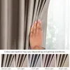 A hand is shown parting a beige curtain to reveal a window with light filtering through. Below the main image, there are five smaller images showing the curtain in different lighting conditions. Produktbild-Vorschau