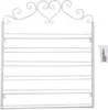 A white metal wall-mounted rack with multiple shelves, designed for displaying items like nail polish. It has decorative scrollwork at the top and includes a small bag of mounting hardware. Podgląd zdjęcia produktu