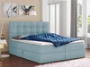 A bedroom scene with a blue boxspring bed. Produktbild-Vorschau