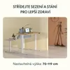 An adjustable height desk in a modern office setting. Anteprima dell’immagine prodotto
