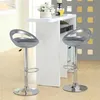 Two gray bar stools are placed in front of a white bar counter. Produktbild-Vorschau