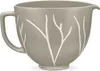 A ceramic mixing bowl with a tree branch design. Produktbild-Vorschau