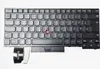 A black laptop keyboard with a red trackpoint is shown from a top-down view on a white background. Produktbild-Vorschau