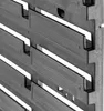 A close-up, angled view of a gray plastic storage system or tool wall. Náhled obrázku produktu