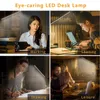 A collage of four images showing a desk lamp being used in different scenarios: working, leaning, drawing, and leisure. Produktbild-Vorschau