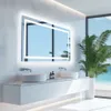 A modern bathroom with a large LED mirror, double sinks, and a view of the ocean through a large window. Podgląd zdjęcia produktu