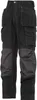 A pair of black work pants with multiple pockets and grey panels on the lower legs, presented against a white background. Produktbild-Vorschau