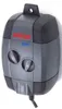 A gray EHEIM air pump is mounted on a white wall. Anteprima dell’immagine prodotto