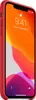 A red iPhone 11 Pro Max in a red silicone case, displayed on a lock screen. Anteprima dell’immagine prodotto