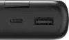 Close-up view of the ports on a black power bank. Náhled obrázku produktu