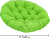 A round, green cushion for a hanging chair. Produktbild-Vorschau