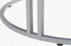 A close-up view of the base of a table, showing the metallic frame and legs. Produktbild-Vorschau