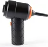 A black and orange handheld vacuum cleaner is shown against a white background. Produktbild-Vorschau