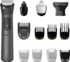 A collection of grooming tools and attachments, including a main trimmer, nose trimmer, and various comb attachments, laid out on a white background. Podgląd zdjęcia produktu