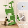 A green cat tree with a cat interacting with it, shown next to a wall with two inset images demonstrating anti-tip features. Podgląd zdjęcia produktu