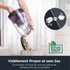 A person is emptying the dustbin of a vacuum cleaner into a container. There are marketing graphics in the background. Produktbild-Vorschau