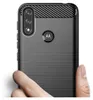 A hand is holding the back of a black smartphone case with a carbon fiber pattern at the top and a Motorola logo in the center. Podgląd zdjęcia produktu