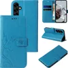A collage of images showing a blue floral and butterfly embossed flip phone case for a Samsung Galaxy S25+. Produktbild-Vorschau