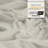 A close-up of a textured beige fabric with a marketing tag overlay. Produktbild-Vorschau