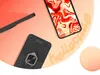 A flat lay of two phone cases and a smartphone on a gradient background. Produktbild-Vorschau