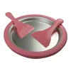 A pink ice cream maker plate with two pink spatulas on a white background. Podgląd zdjęcia produktu