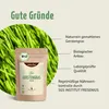 A product shot of Achterhof Gerstengras Pulver with descriptive text and green grass background. Produktbild-Vorschau