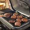 Burgers are being grilled on an outdoor electric grill. Voir les images du produit