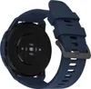 The back of a blue smartwatch with its strap. Náhľad obrázku produktu