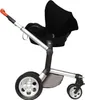 A side view of a black baby car seat canopy attached to a stroller frame. Náhled obrázku produktu