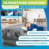 A man sleeping on an inflatable mattress in a room, with product features highlighted. Produktbild-Vorschau