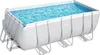 A rectangular above-ground swimming pool filled with blue water, supported by a metal frame. Produktbild-Vorschau