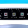 A close-up view of the control panel of a water dispenser, showing a digital display and indicator lights for hot, cold, and warm water. Podgląd zdjęcia produktu