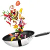 A collection of fresh vegetables and ingredients are shown flying out of a wok pan. Produktbild-Vorschau