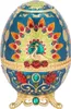 A decorative egg-shaped box with a peacock design. Produktbild-Vorschau
